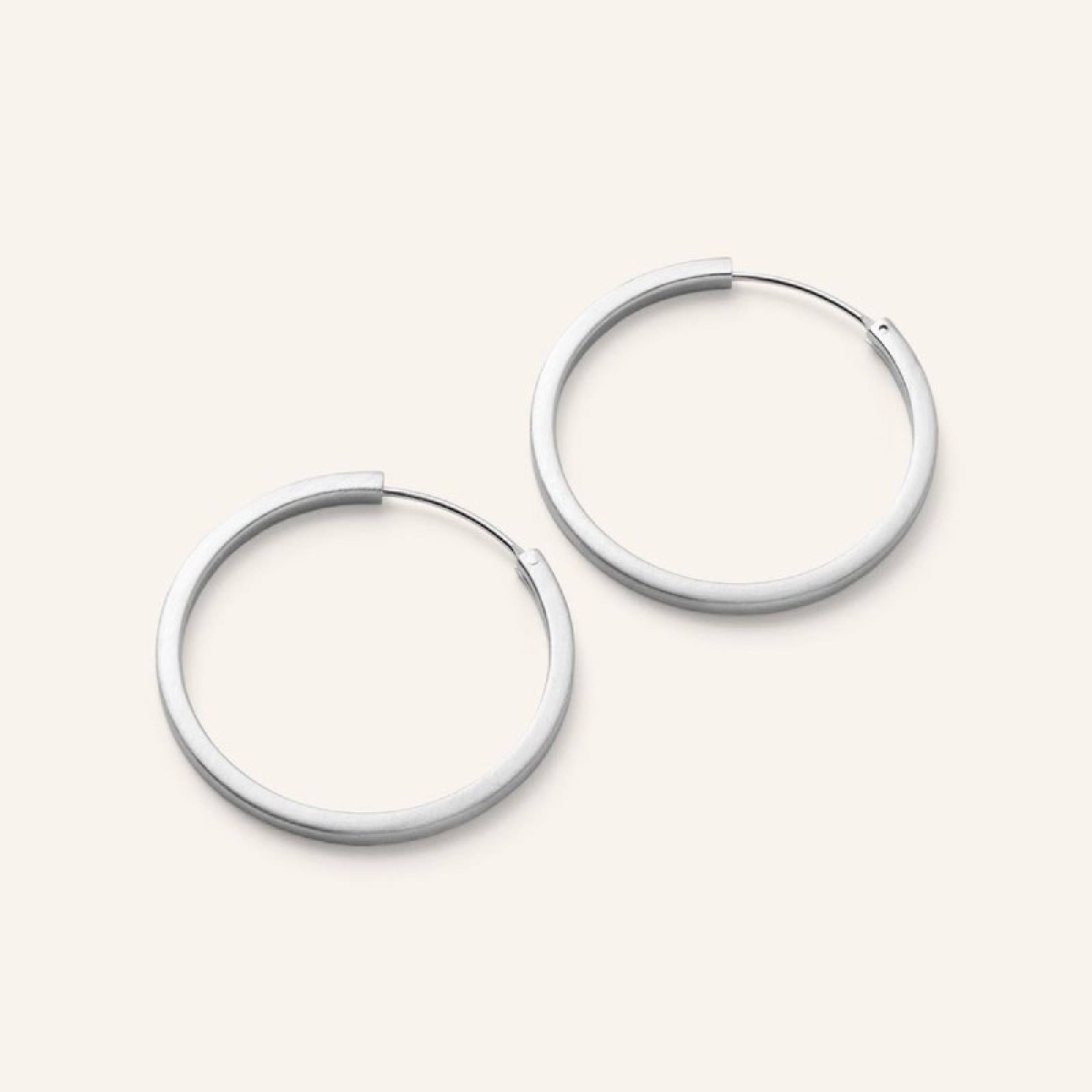 Medium Circle Line Hoop Earrings In Silver By Pernille Corydon