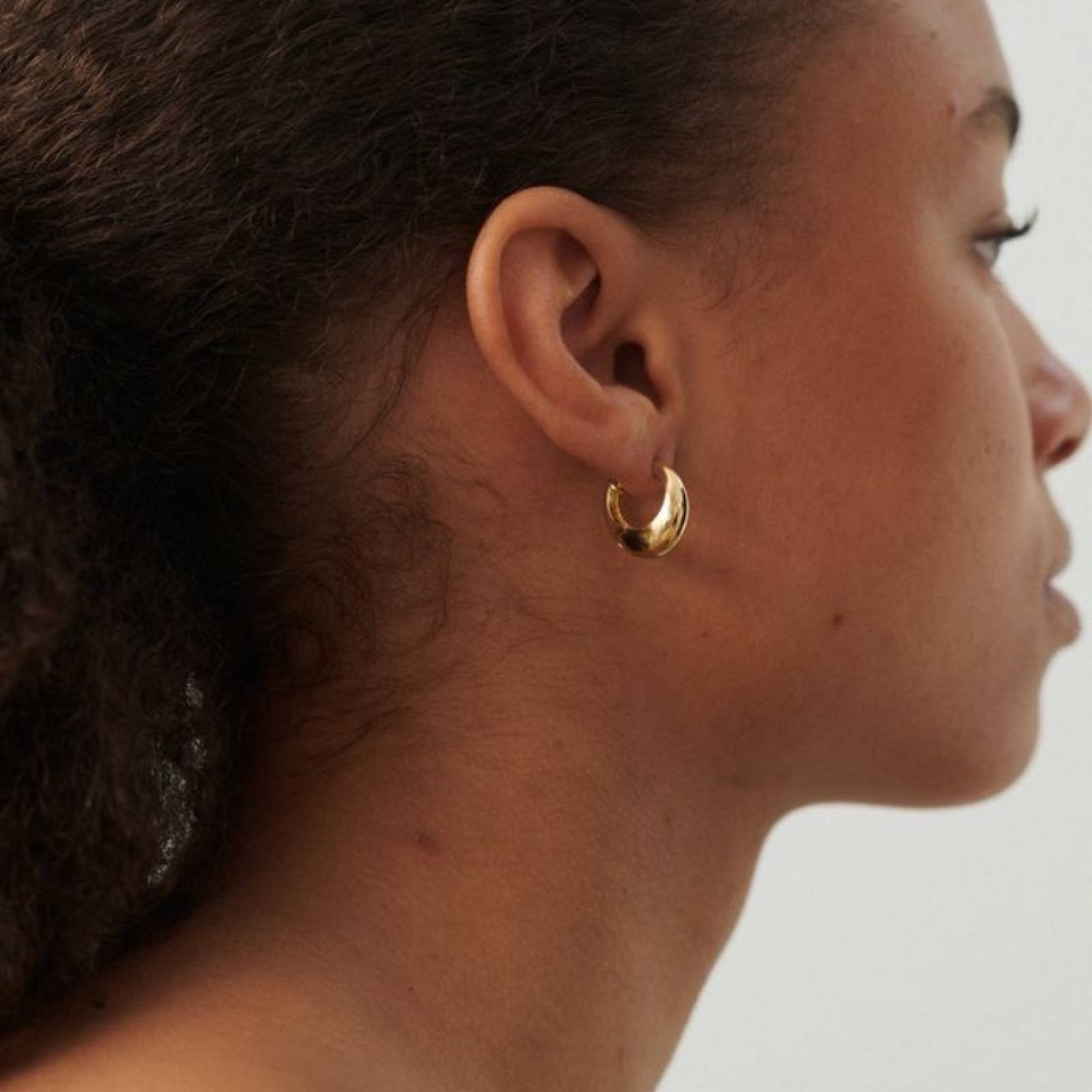 Mini Globe Huggies Hoop Earrings In Gold By Pernille Corydon thumbnails