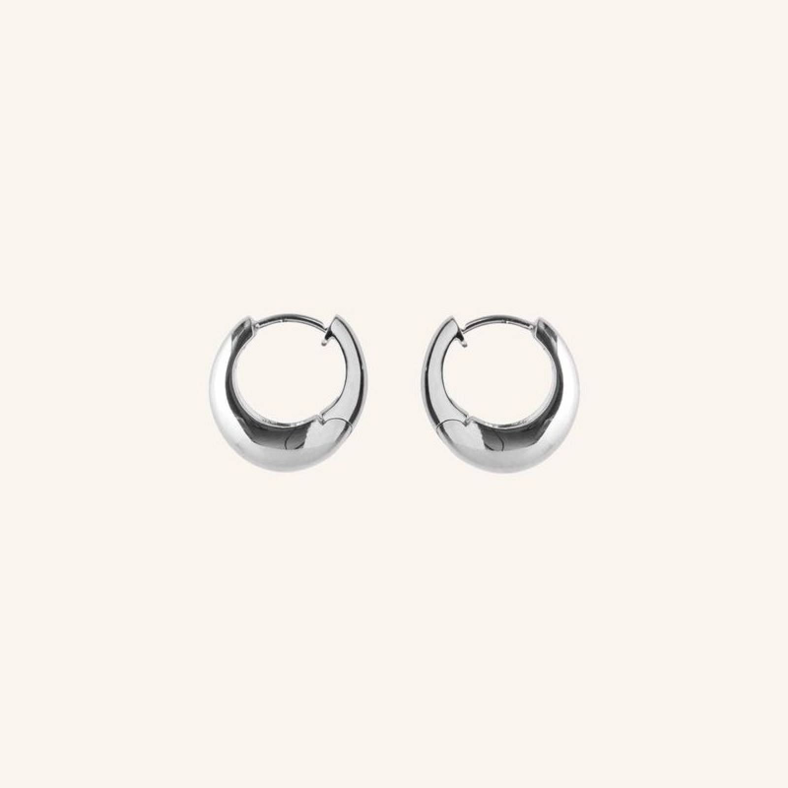 Mini Globe Huggies Hoop Earrings In Silver By Pernille Corydon