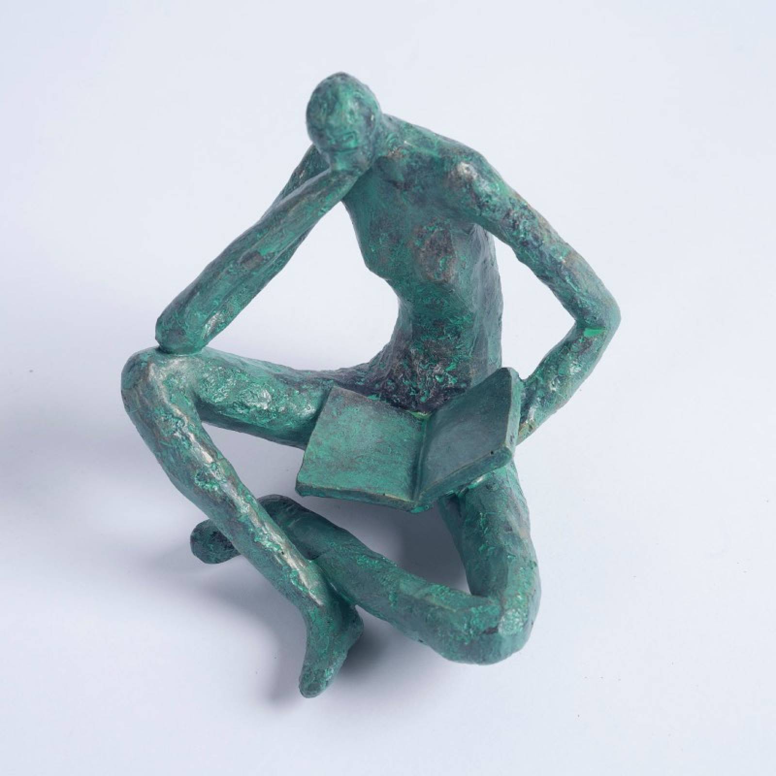 Reading Figure Resin Ornament thumbnails