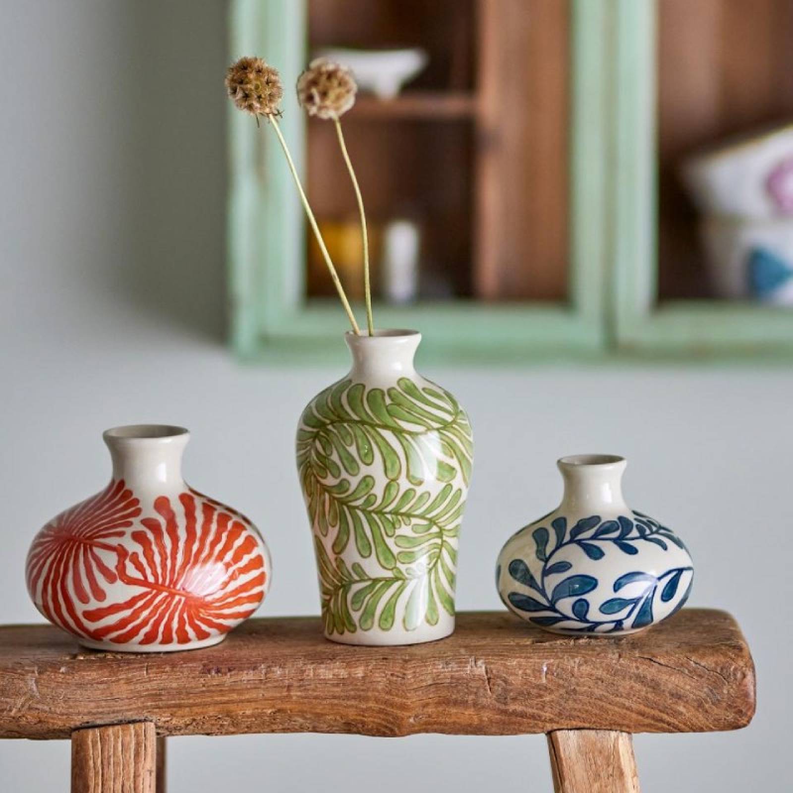 Small Ceramic Vase With Green Plant Design