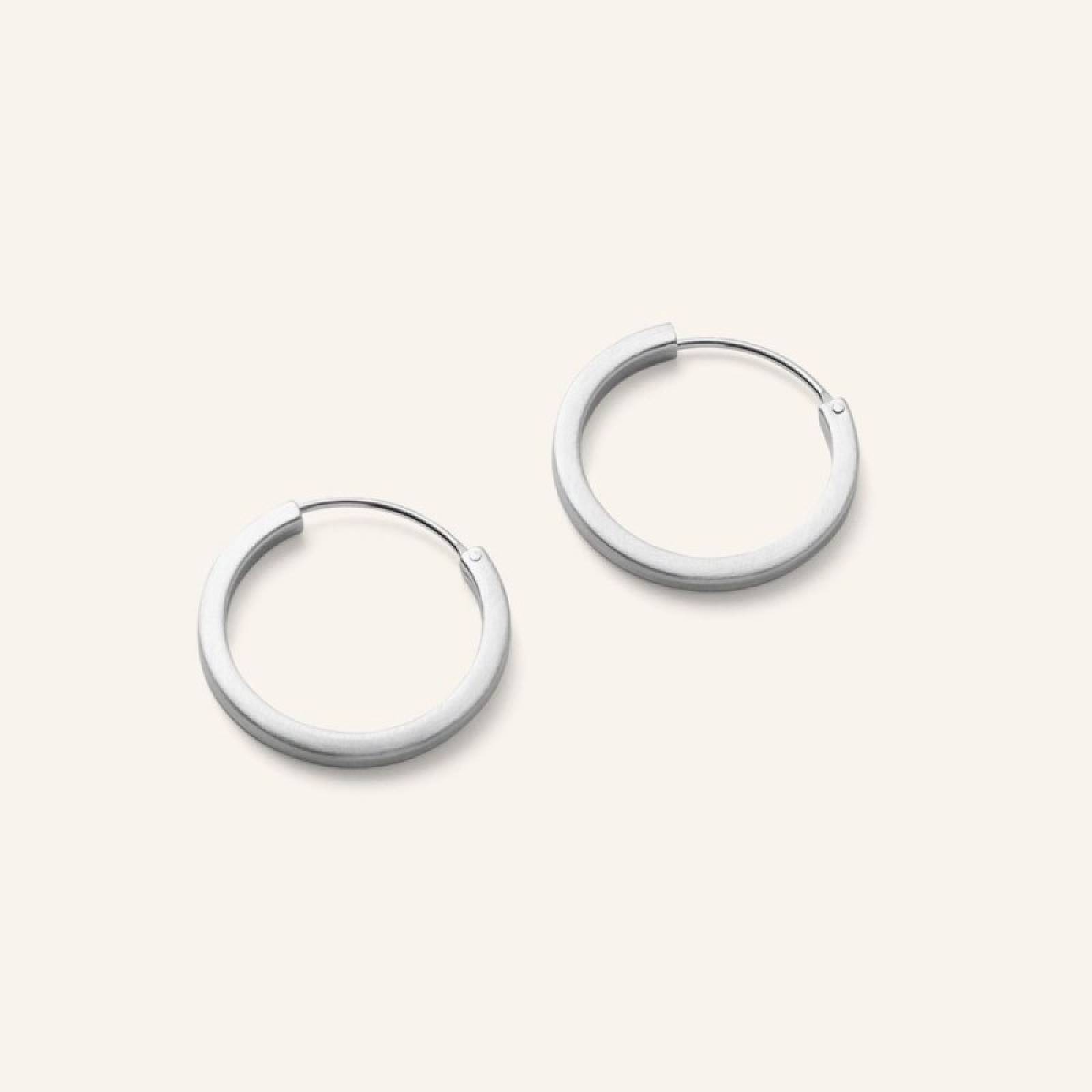 Small Circle Line Hoop Earrings In Silver By Pernille Corydon