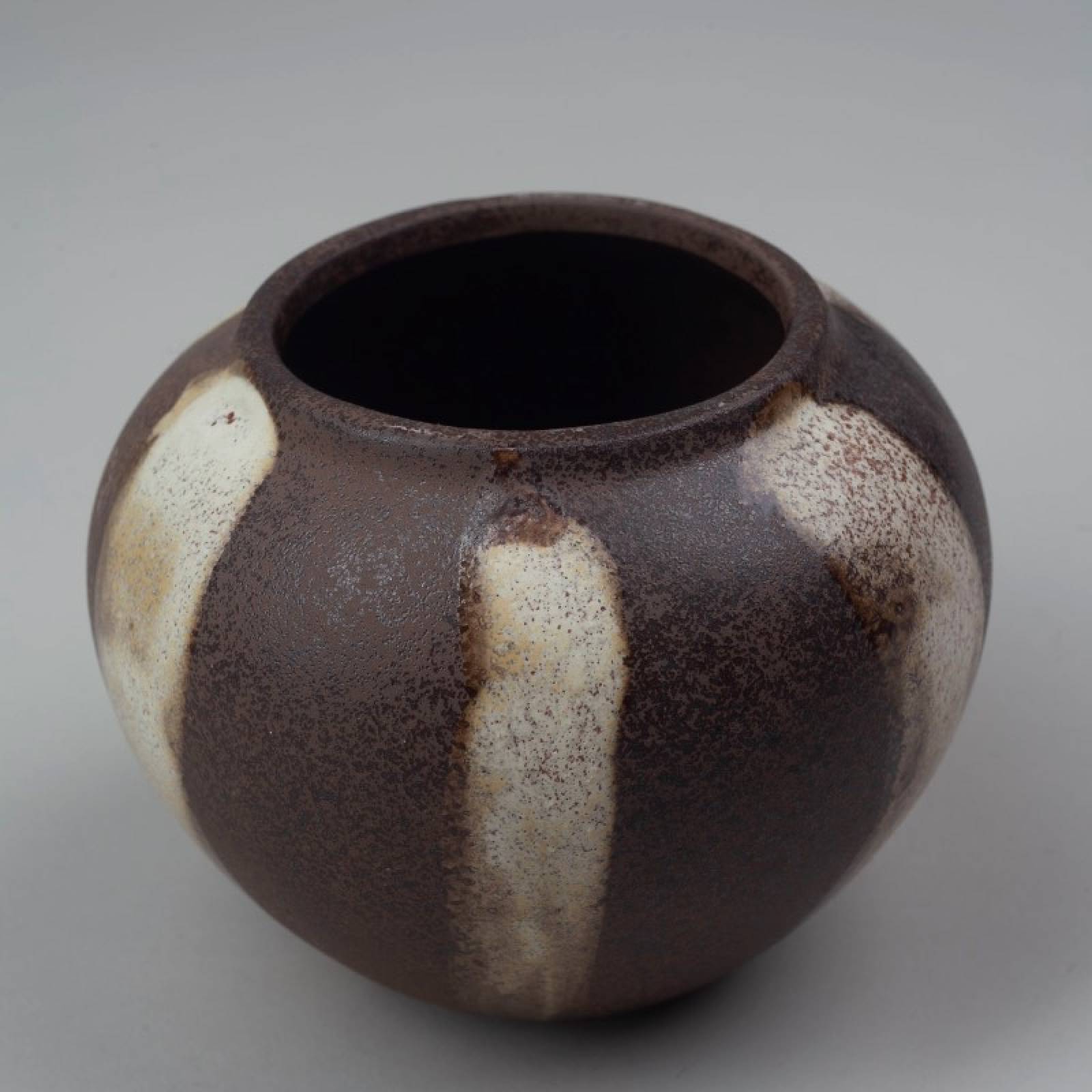 Small Round Stoneware Vase In Brown & Off White thumbnails