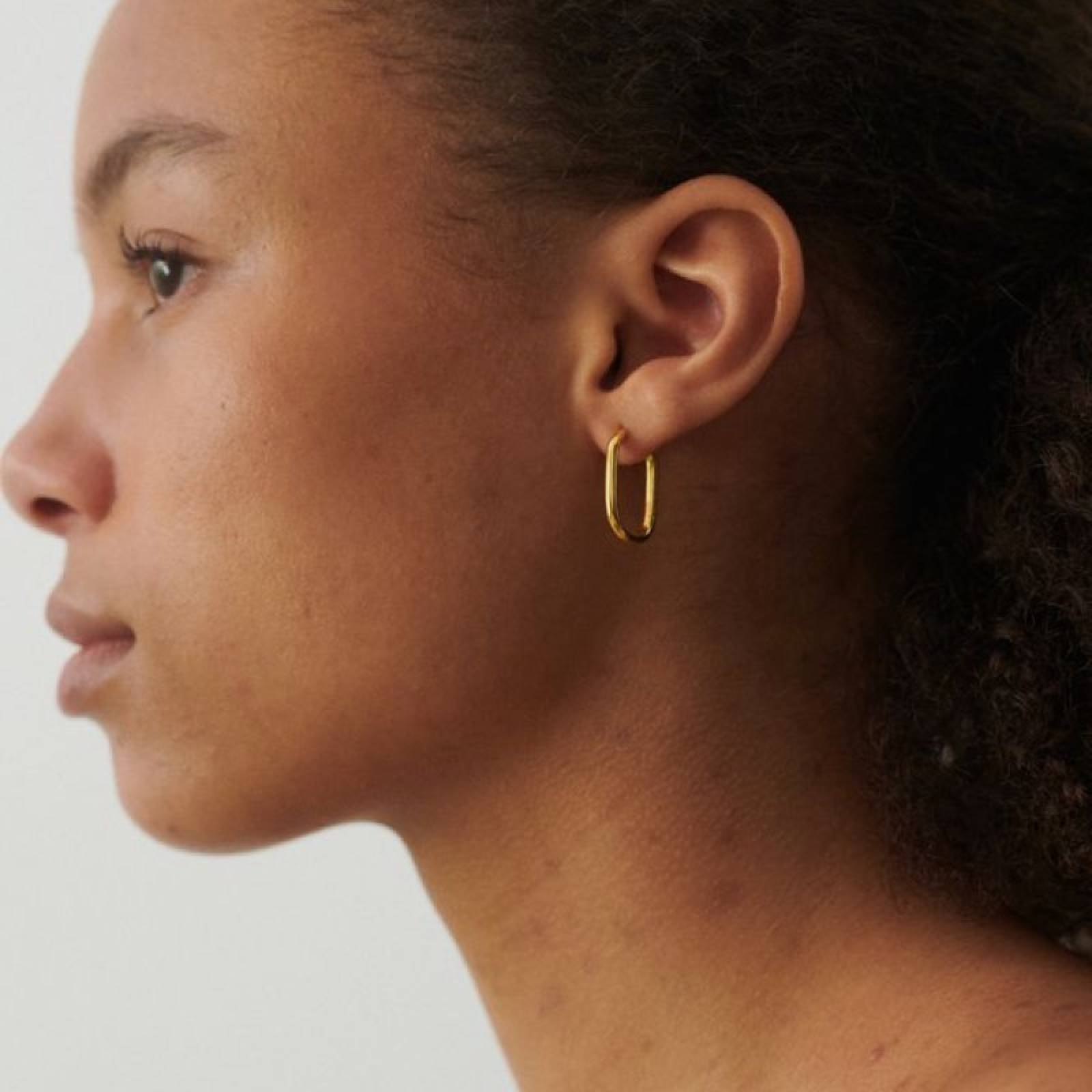 Soft Edge Huggies Hoop Earrings In Gold By Pernille Corydon thumbnails