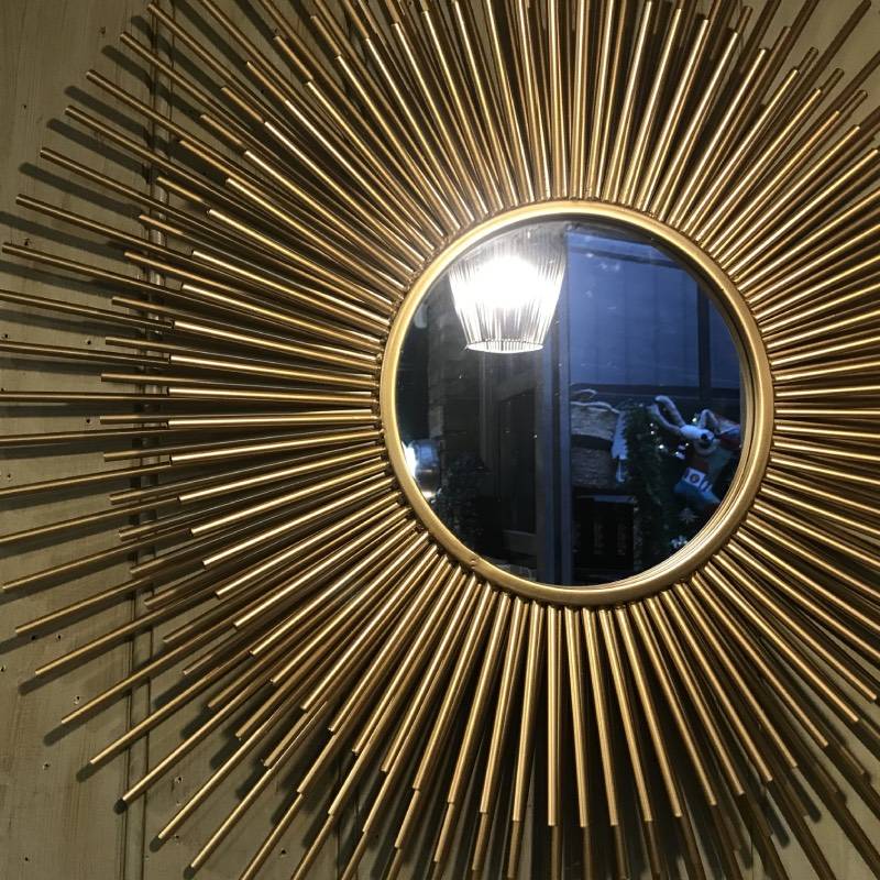 Layered Metal Tubular Sunburst Mirror In Gold