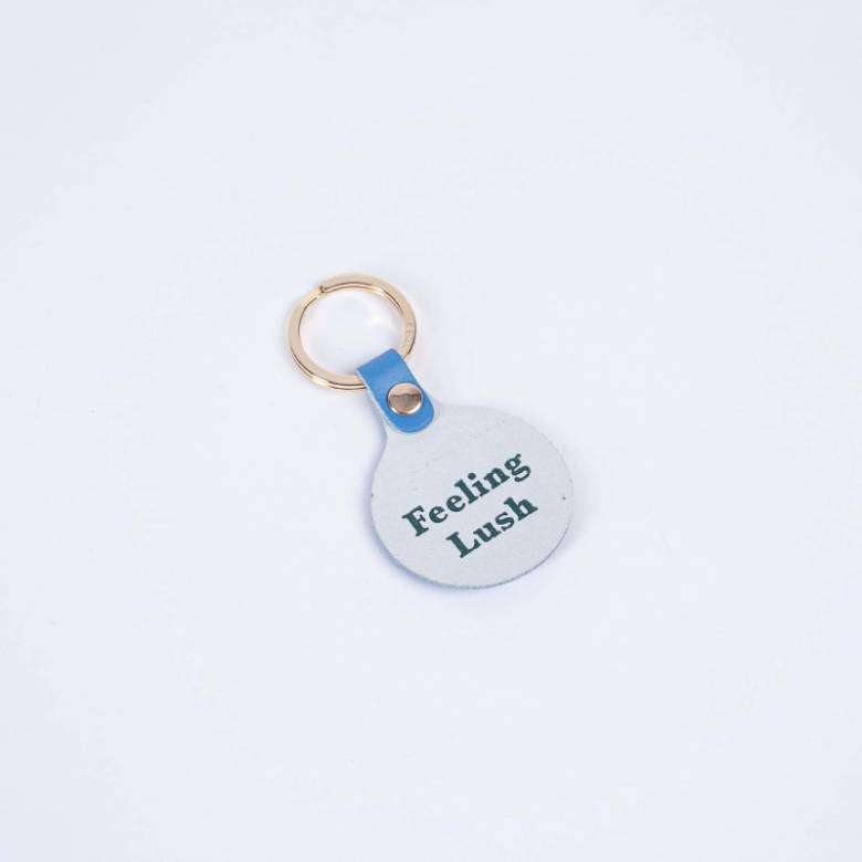 Feeling Lush Smiley Leather Keyring In Cornflower Blue