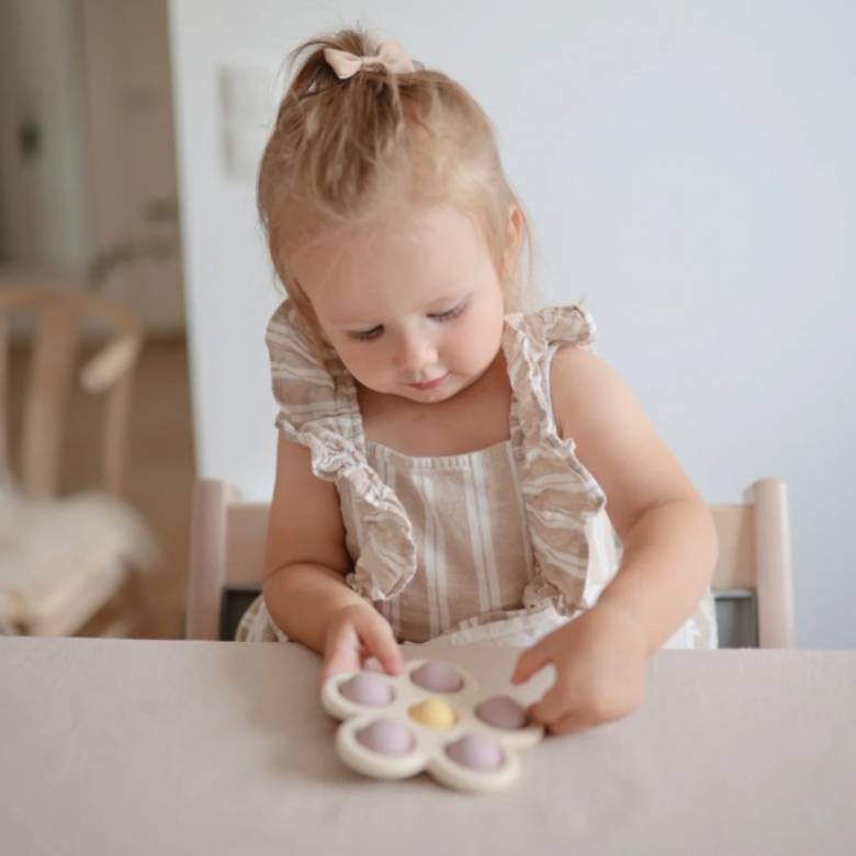 Flower Press Silicone Toy In Soft Lilac 10m+