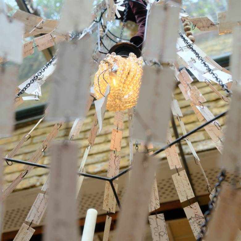 Manuscript Paper and Metal Chandelier Light