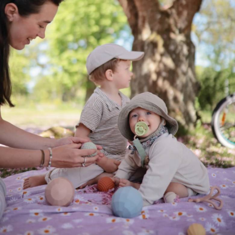 Nesting Spheres Silicone Sensory Toy In Blush 10m+