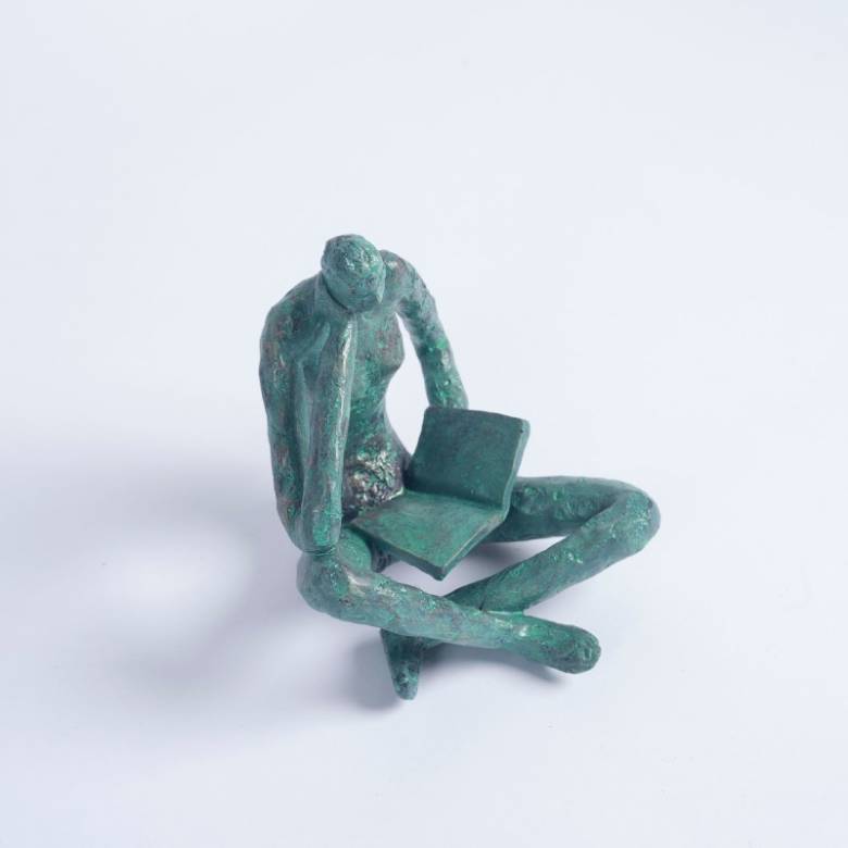 Reading Figure Resin Ornament