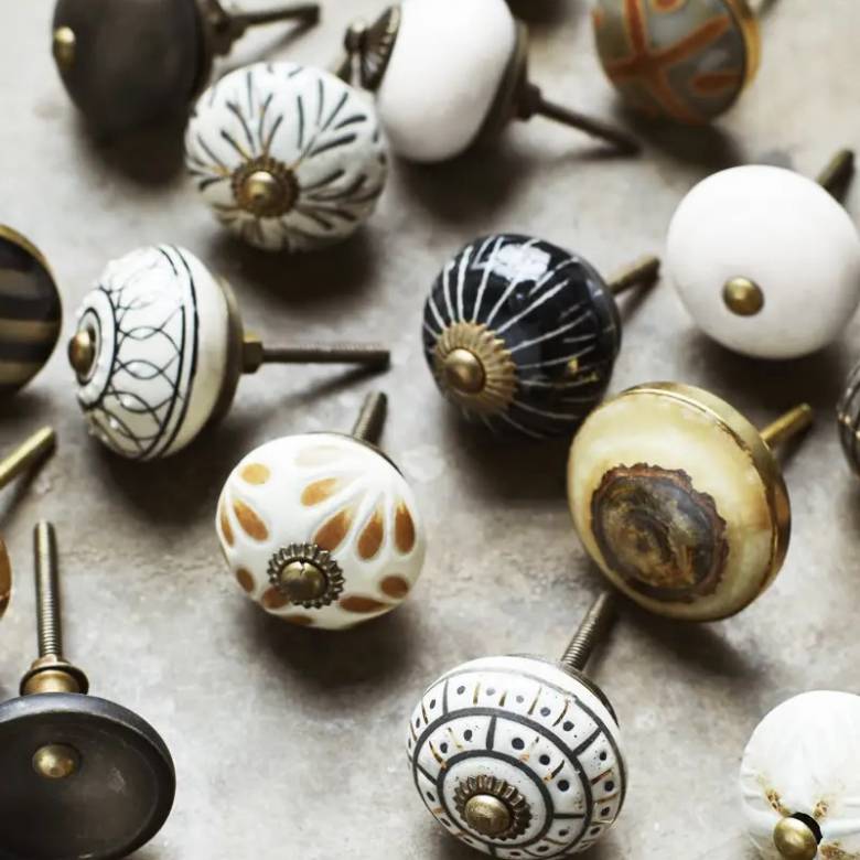 Single Handmade Stoneware Doorknob In Matte Black & Brass