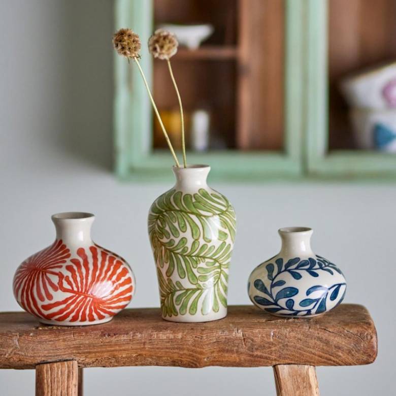 Small Ceramic Vase With Blue Plant Design